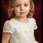 Amora Rain joined the competition — help win amazing prizes! background, blonde, blue_eyes, child, curly_hair, cute, elegant, fashion, formal, girl, lace, pearl_embellishments, portrait, princess, red_curtain, smile, studio, tiara, white_dress, young