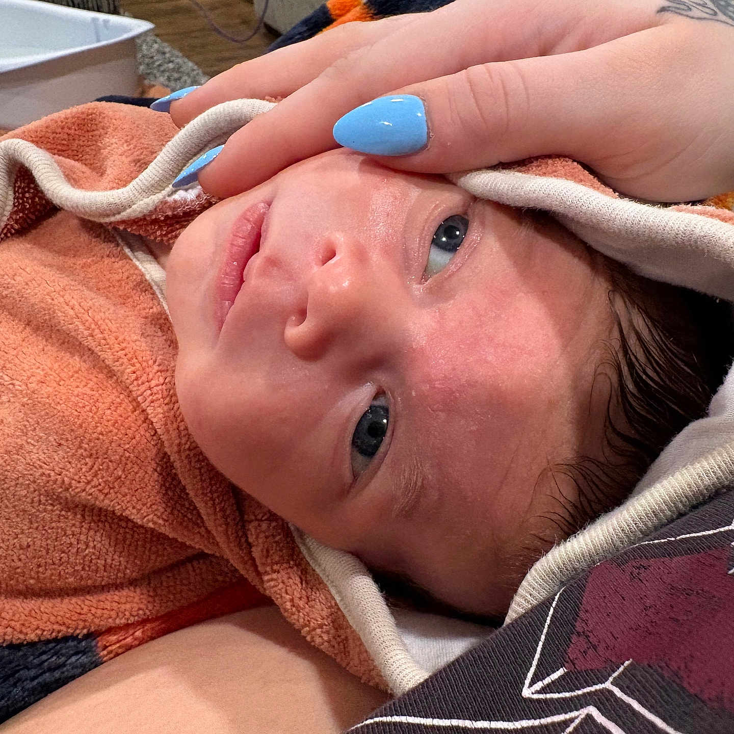 Theo is registered to the contest to win money with this photo: architecture, baby, blanket, building, childbirth, crying, face, happy, head, hospital, newborn, person, photography, portrait, quilt, sad, skin, smile, towel