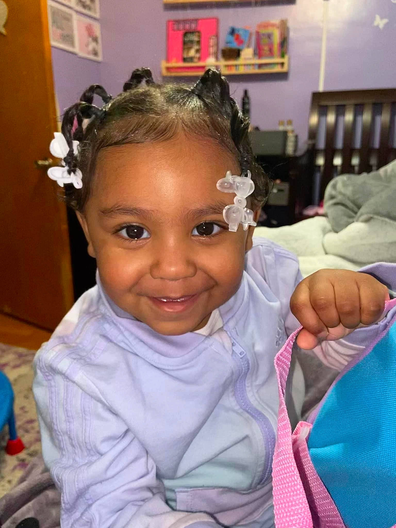 Iyanna is registered to the contest to win money with this photo: baby_toddler_clothing, black_hair, cheek, child, ear, event, eyebrow, eyelash, fashion_accessory, forehead, fun, gesture, hair_accessory, happy, headband, headpiece, jewellery, joy, person, picture_frame