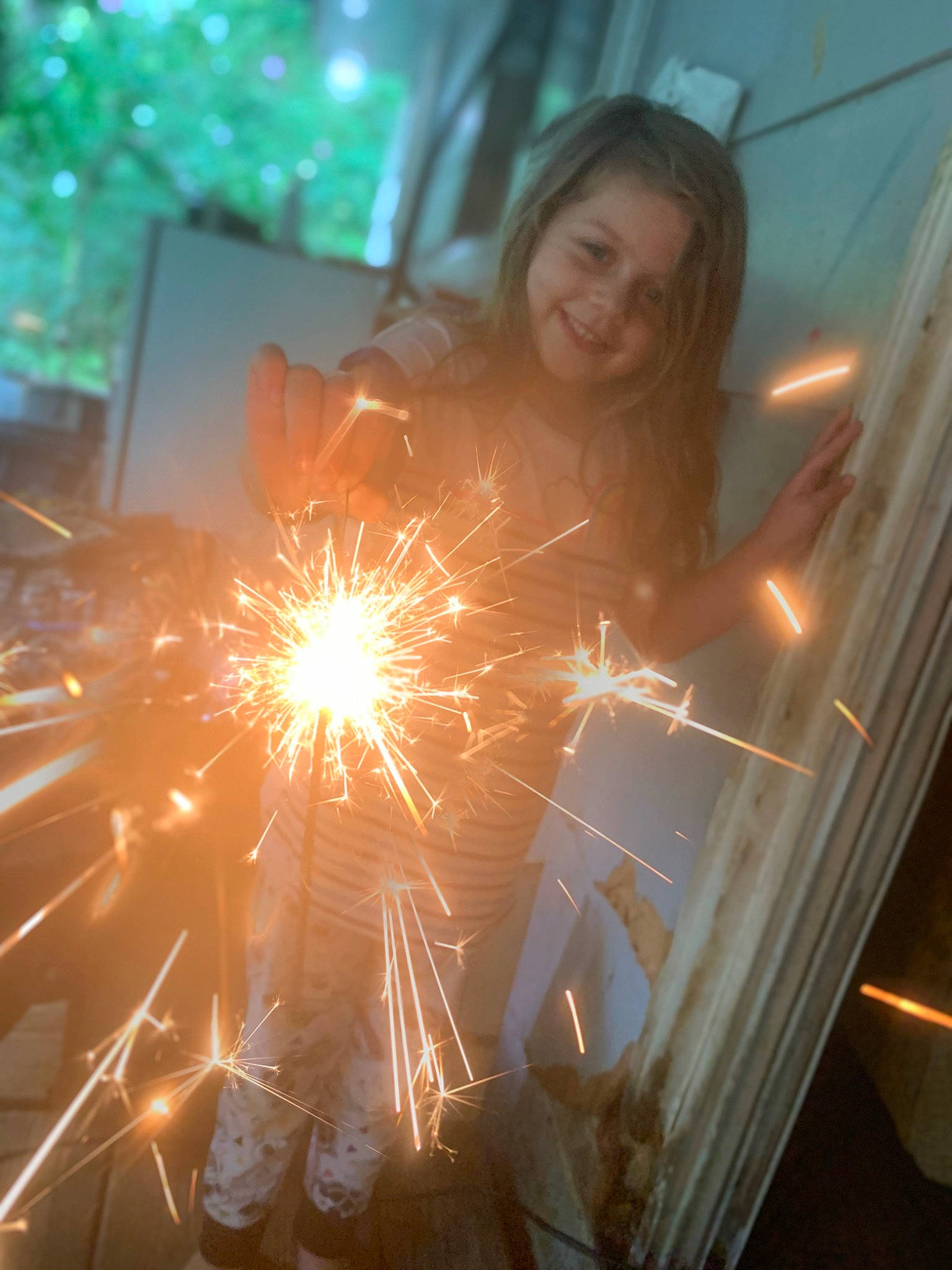 Zoeigh is registered to the contest to win money with this photo: art, darkness, diwali, electric_blue, event, fireworks, flash_photography, fun, heat, holiday, joy, lens_flare, metal, midnight, new_year, new_years_day, party_supply, person, recreation, smile
