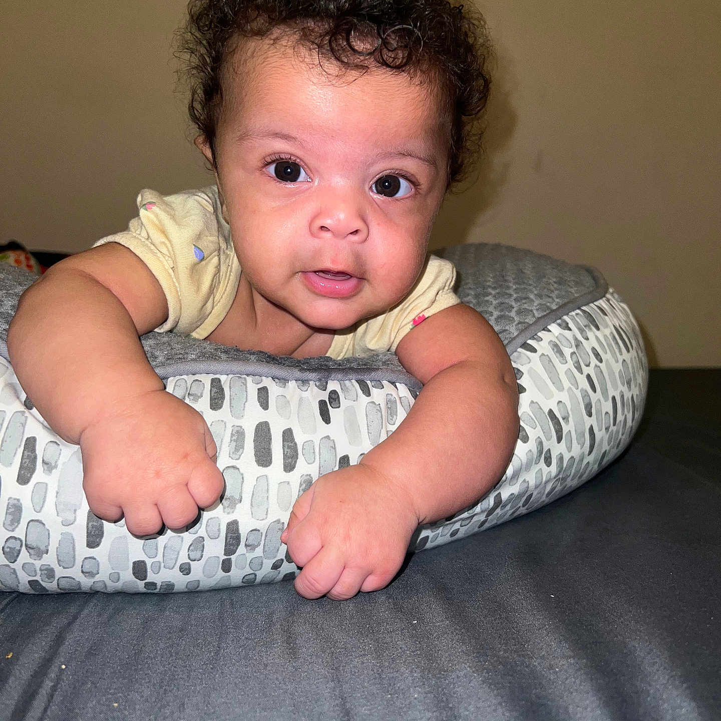 Priya joined the competition — help win amazing prizes! accessories, ankle, arm, baby, bed, bedroom, blackhair, blanket, bodypart, bracelet, clothing, couch, crawling, crib, cushion, dress, face, finger, furniture, hair