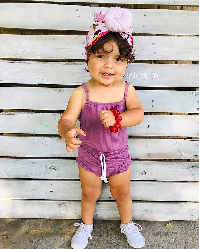 Avaya is registered to the contest to win money with this photo: baby, baby_bloomers, baby_toddler_clothing, child, child_model, clothing, fashion_accessory, hair_accessory, headband, headgear, joy, pattern, person, pink, plant, play, shorts, smile, t_shirt, textile