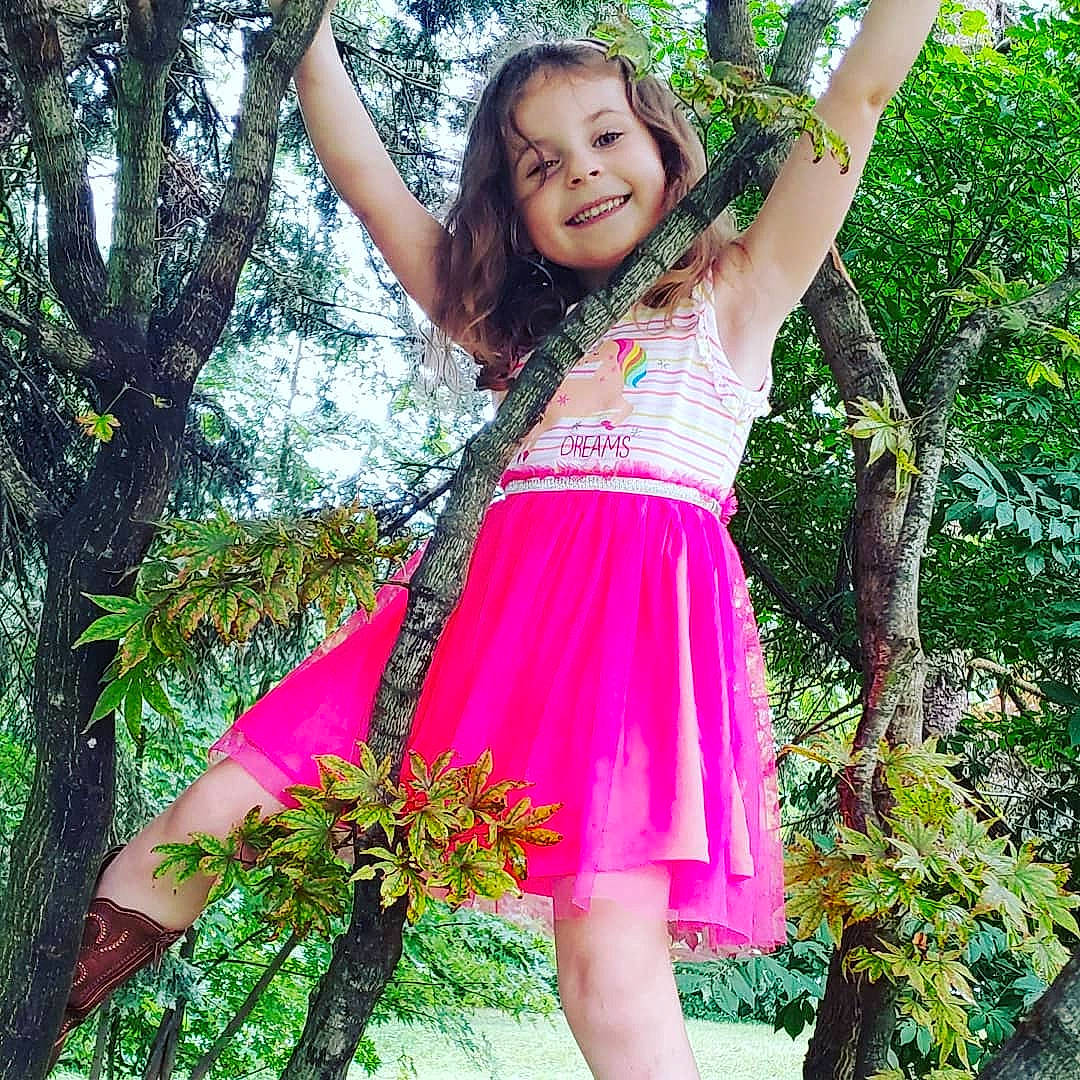 Natalyn is registered to the contest to win money with this photo: abdomen, beauty, botany, child_model, dress, green, happy, joy, lady, long_hair, model, person, photo_shoot, photography, pink, plant, smile, spring, summer, tree