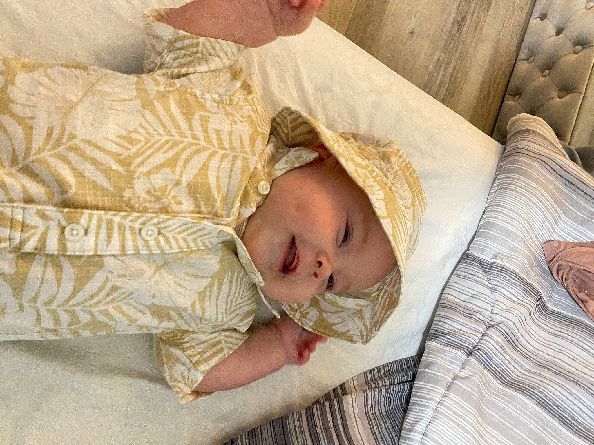 Lucca joined the competition — help win amazing prizes! baby, baby_toddler_clothing, bedding, bedtime, child, comfort, couch, grass, hat, headwear, linens, nap, pattern, person, room, sitting, sleep, toddler, tree, wood