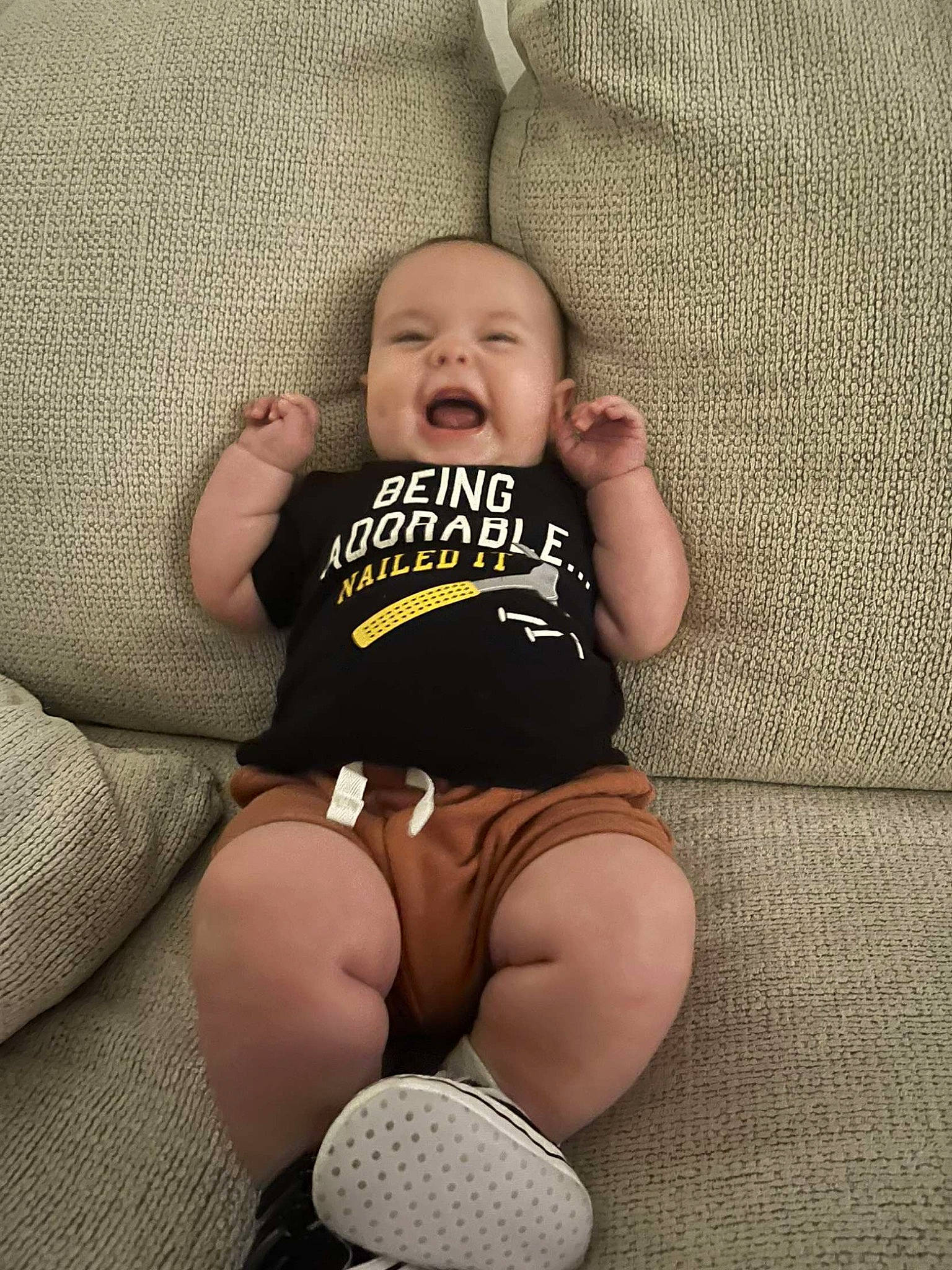 Lucca is registered to the contest to win money with this photo: baby, baby_toddler_clothing, comfort, eye, face, finger, flash_photography, human_body, iris, knee, leg, person, shorts, skin, sleeve, smile, stomach, t_shirt, thigh, toddler