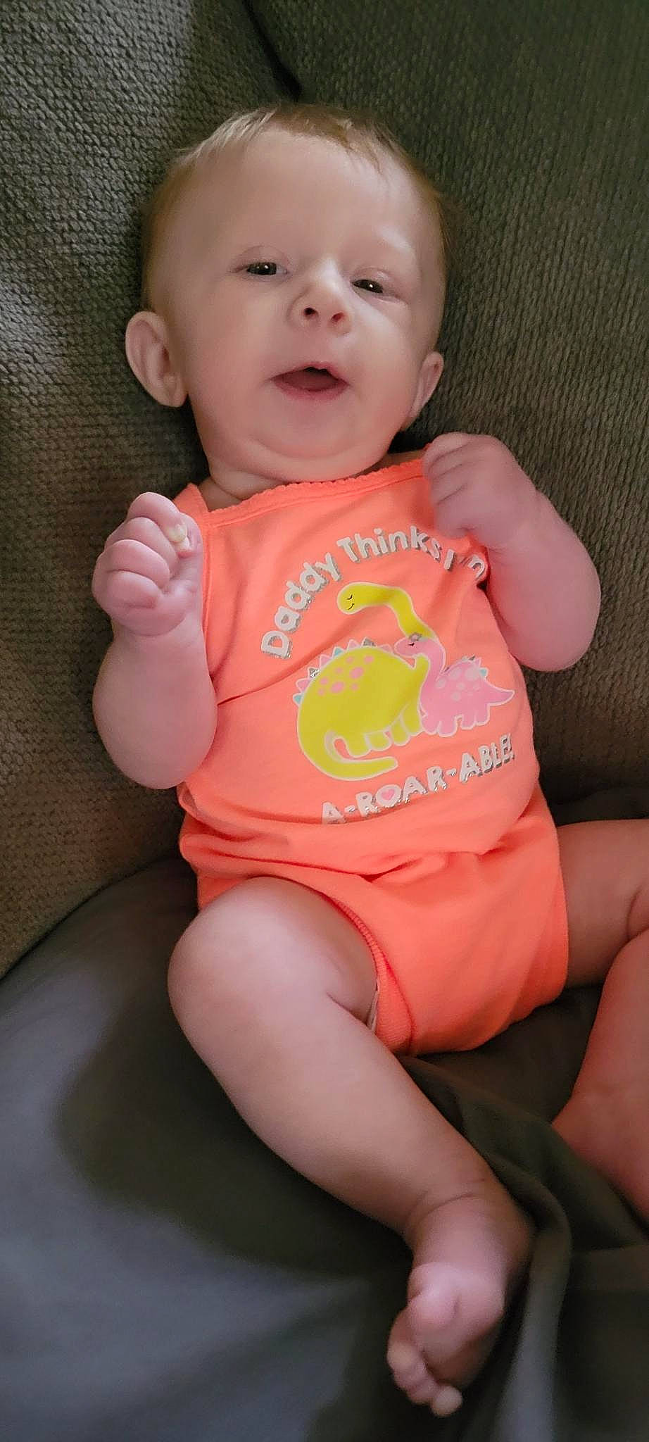 Evelynn is registered to the contest to win money with this photo: baby, baby_products, baby_toddler_clothing, cheek, eyelash, finger, happy, iris, lip, mouth, neck, nose, person, pink, skin, sleeve, stomach, t_shirt, thigh, thumb