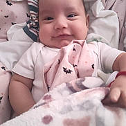 Michael Schmelzer joined the competition — help win amazing prizes! baby, infant, smiling, blanket, bedding, cozy, cute, child, face, portrait, soft, comfort, indoors, sleepwear, pattern, bat, clothing, young, happy, resting
