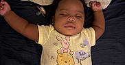 Naela joined the competition — help win amazing prizes! arms_up, baby, bed, child, clothing, cute, dark_background, indoors, infant, onesie, pacifier, peaceful, person, piglet, pillow, relaxing, resting, sleeping, soft_lighting, winnie_the_pooh