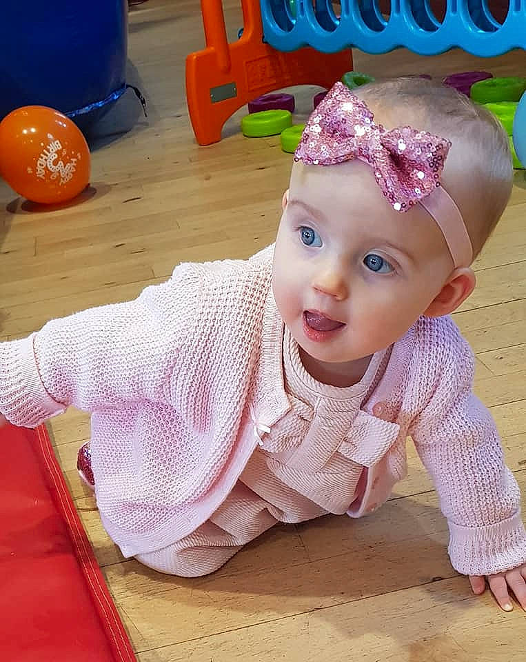 Jorgie Girl is registered to the contest to win money with this photo: baby, baby_toddler_clothing, child, crochet, fun, hair_accessory, headband, headgear, pattern, person, play, toddler