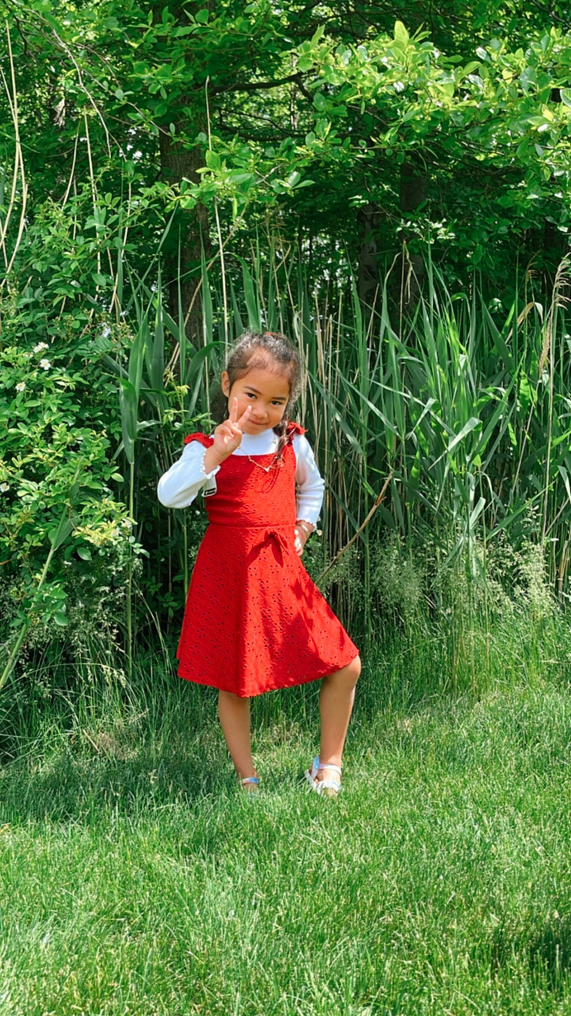 Kiliana is registered to the contest to win money with this photo: baby_toddler_clothing, day_dress, fawn, garden, grass, grassland, groundcover, joy, lawn, leaf, meadow, one_piece_garment, pattern, people_in_nature, person, plant, prairie, shrub, sleeve, terrestrial_plant
