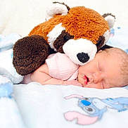 Luci is registered to the contest to win money with this photo: baby, blanket, child, comfort, cozy, cute, face, head, infant, newborn, nursery, peaceful, pink_clothing, plush, portrait, rest, sleep, sleeping, soft_toy, teddy_bear