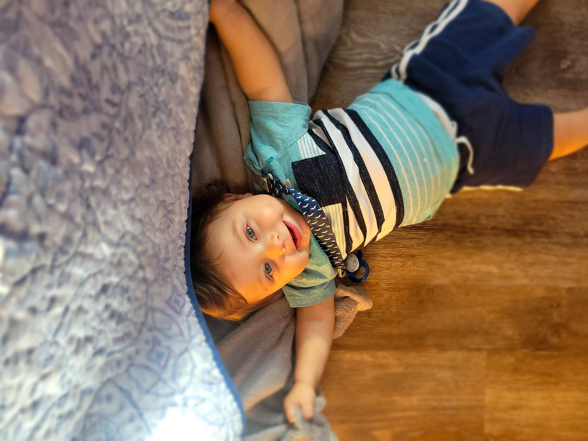 Hudson joined the competition — help win amazing prizes! child, denim, elbow, floor, flooring, foot, fun, gesture, happy, hardwood, human_leg, leisure, pattern, person, sitting, sleeve, soil, toddler, tree, wood