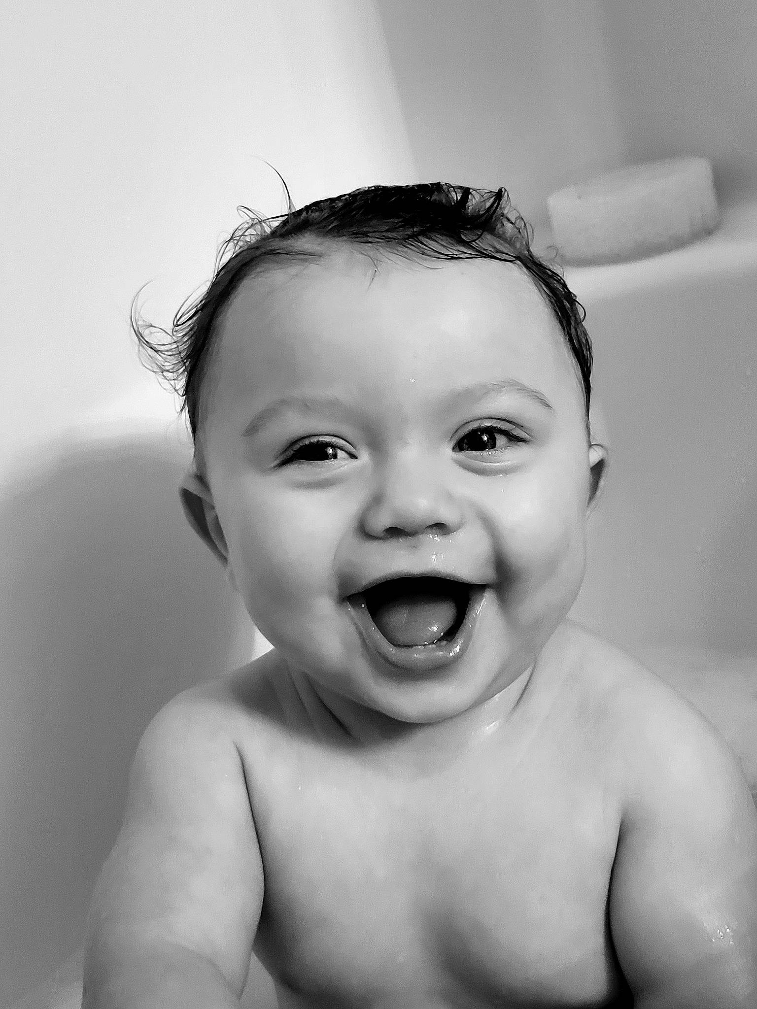 Hudson is registered to the contest to win money with this photo: arm, cheek, chin, ear, eye, eyebrow, eyelash, flash_photography, forehead, hair, head, jaw, lip, mouth, nose, organ, person, skin, smile, tooth