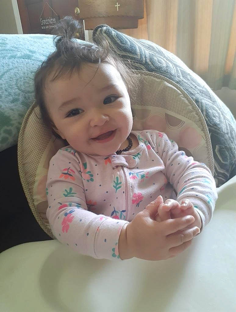 Pennilane is registered to the contest to win money with this photo: baby, baby_toddler_clothing, cheek, chin, comfort, eye, face, finger, happy, head, human_body, iris, lip, mouth, nose, person, skin, sleeve, smile, textile