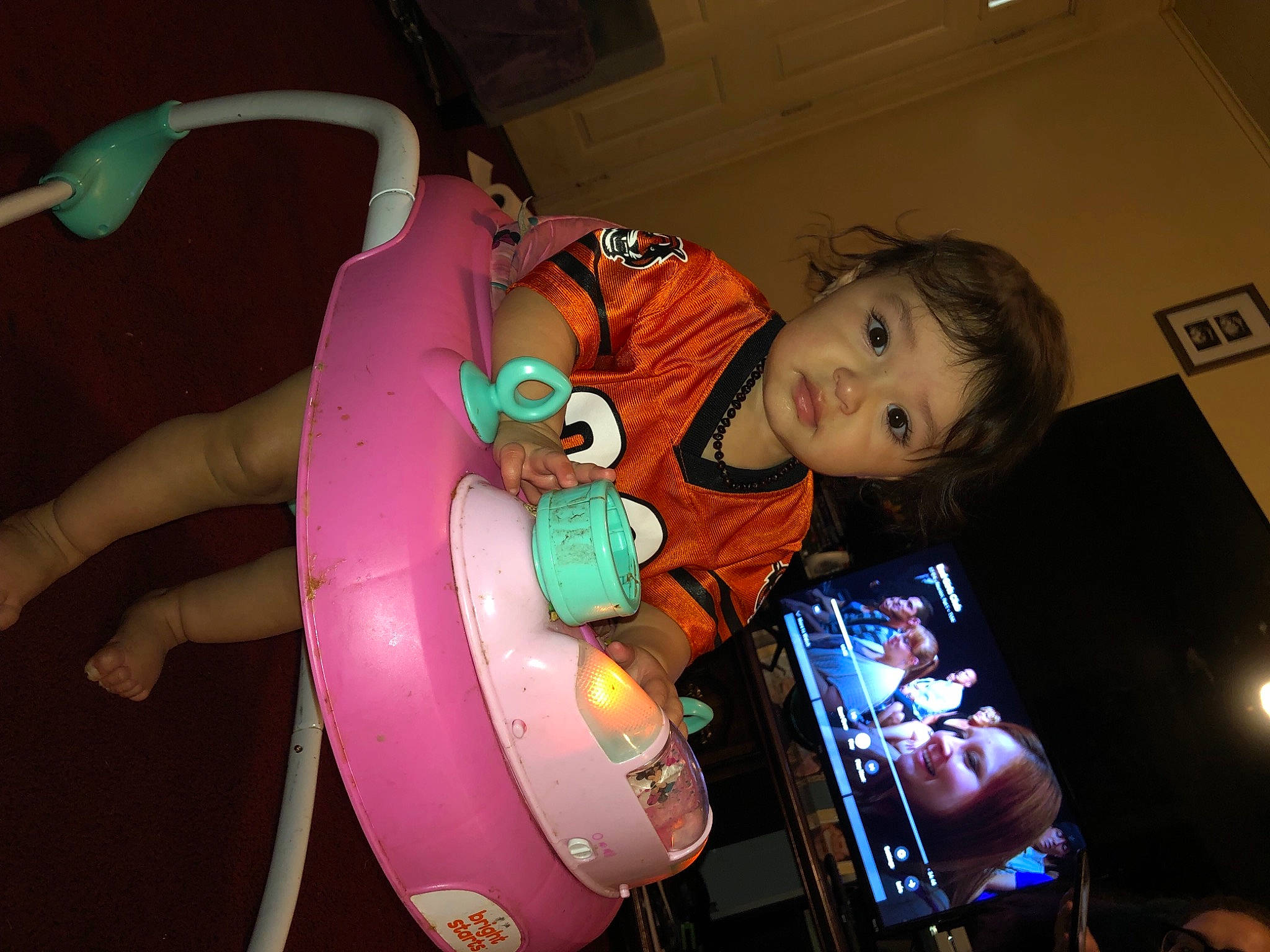 Pennilane is registered to the contest to win money with this photo: baby, baby_products, child, costume, display_device, entertainment, event, fun, joy, machine, magenta, person, personal_protective_equipment, portable_communications_device, recreation, smile, space, t_shirt, toddler, toy