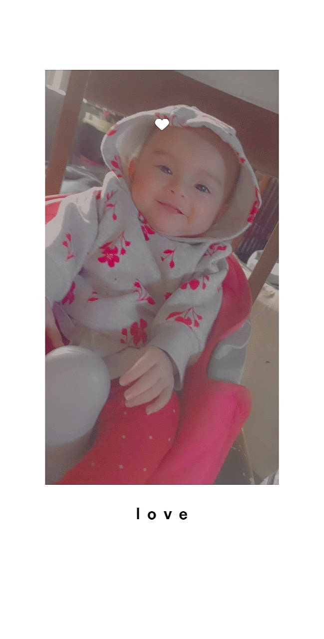 Mazikeen is registered to the contest to win money with this photo: baby, baby_carriage, baby_products, baby_toddler_clothing, cap, cheek, child, comfort, fashion_accessory, happy, hat, headgear, headwear, magenta, person, photo_caption, portrait_photography, sitting, sleeve, smile