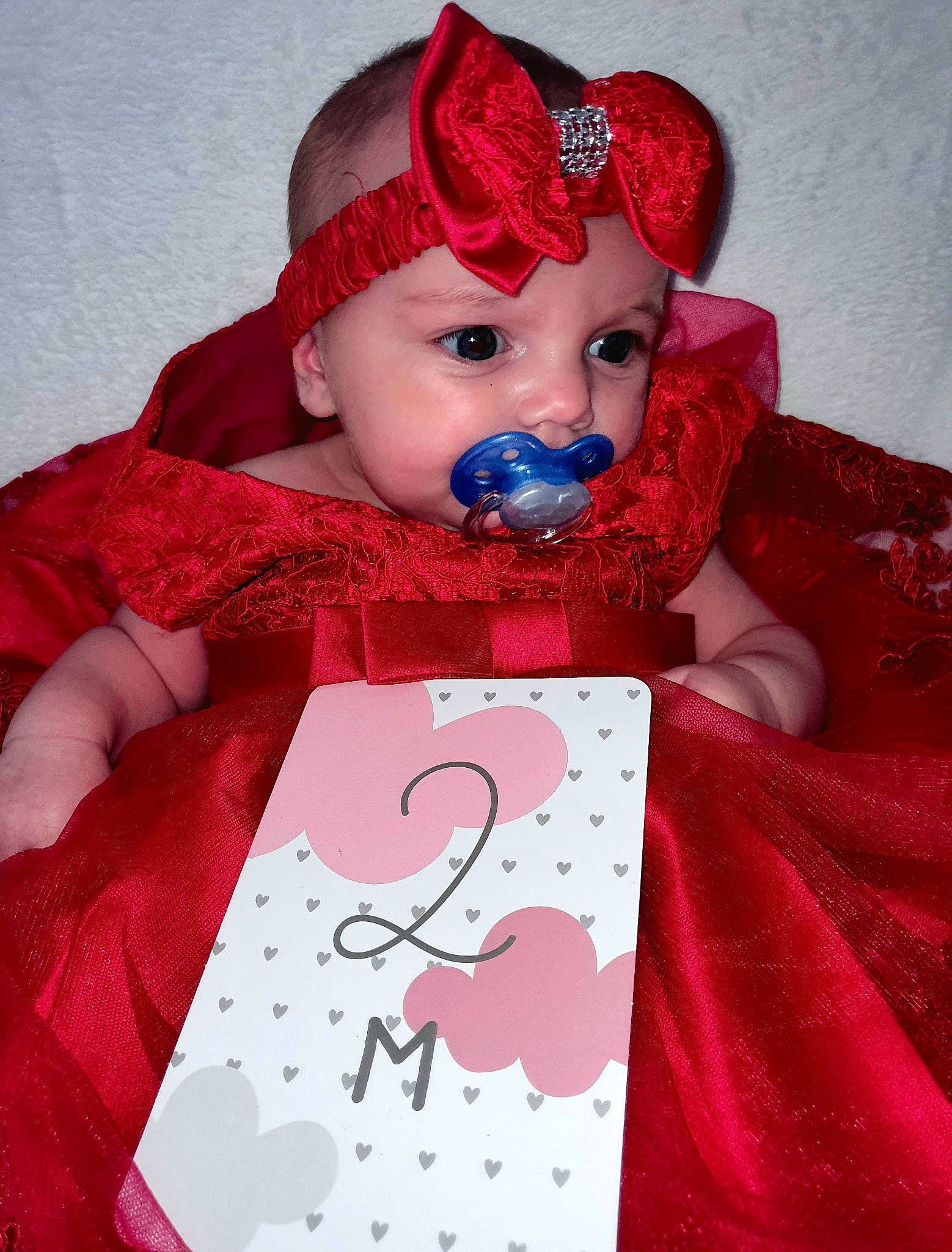 Arya a rejoint le concours — aidez-le/la à gagner de superbes lots ! art, baby, baby_toddler_clothing, cap, carmine, child, costume_hat, dress, fashion_accessory, hat, headwear, knit_cap, linens, magenta, pattern, person, petal, pink, red, sleeve