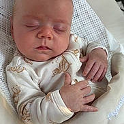 Hudson joined the competition — help win amazing prizes! baby, sleeping, onesie, teddy_bear_print, infant, baby_rocker, peaceful, soft_fabric, hand, face, head, newborn, resting, comfort, indoor, closeup, cute, child, portrait, relaxing