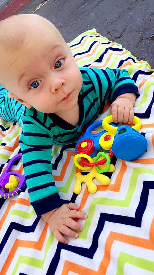 Kasyn is registered to the contest to win money with this photo: baby, baby_playing_with_toys, baby_products, baby_toddler_clothing, baby_toys, blanket, child, person, play, product, toddler, toy, tummy_time