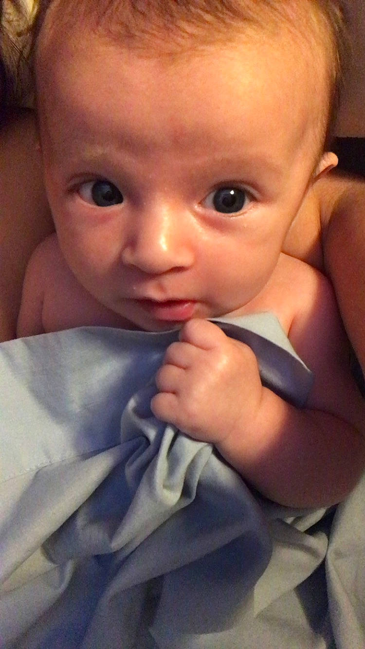 Journey is registered to the contest to win money with this photo: baby, baby_toddler_clothing, cheek, chest, comfort, ear, eye, eyebrow, eyelash, finger, gesture, hand, iris, lip, mouth, nail, nose, person, skin, thumb