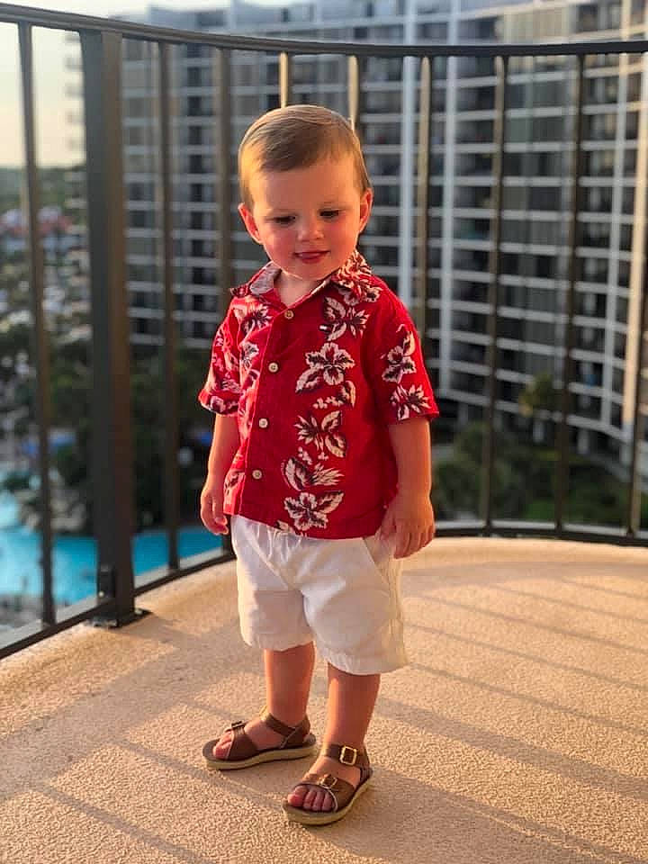 Bryar is registered to the contest to win money with this photo: child, child_model, design, dress, footwear, maroon, outerwear, pattern, person, photography, play, red, shoe, sleeve, smile, snapshot, standing, summer, t_shirt, toddler