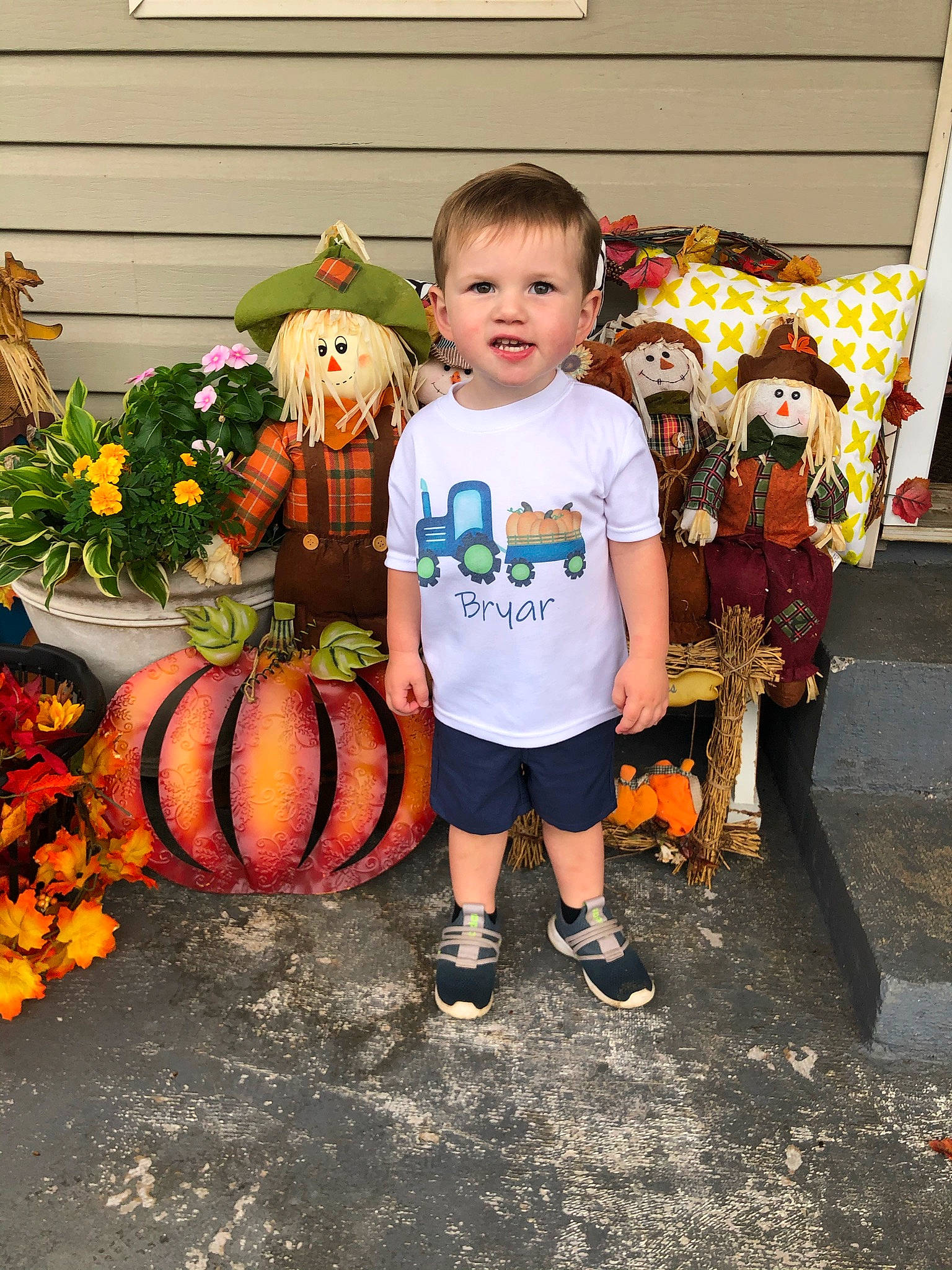 Bryar is registered to the contest to win money with this photo: calabaza, child, costume, cucurbita, gourd, joy, local_food, person, plant, pumpkin, toddler, trick_or_treat, vegetable, winter_squash