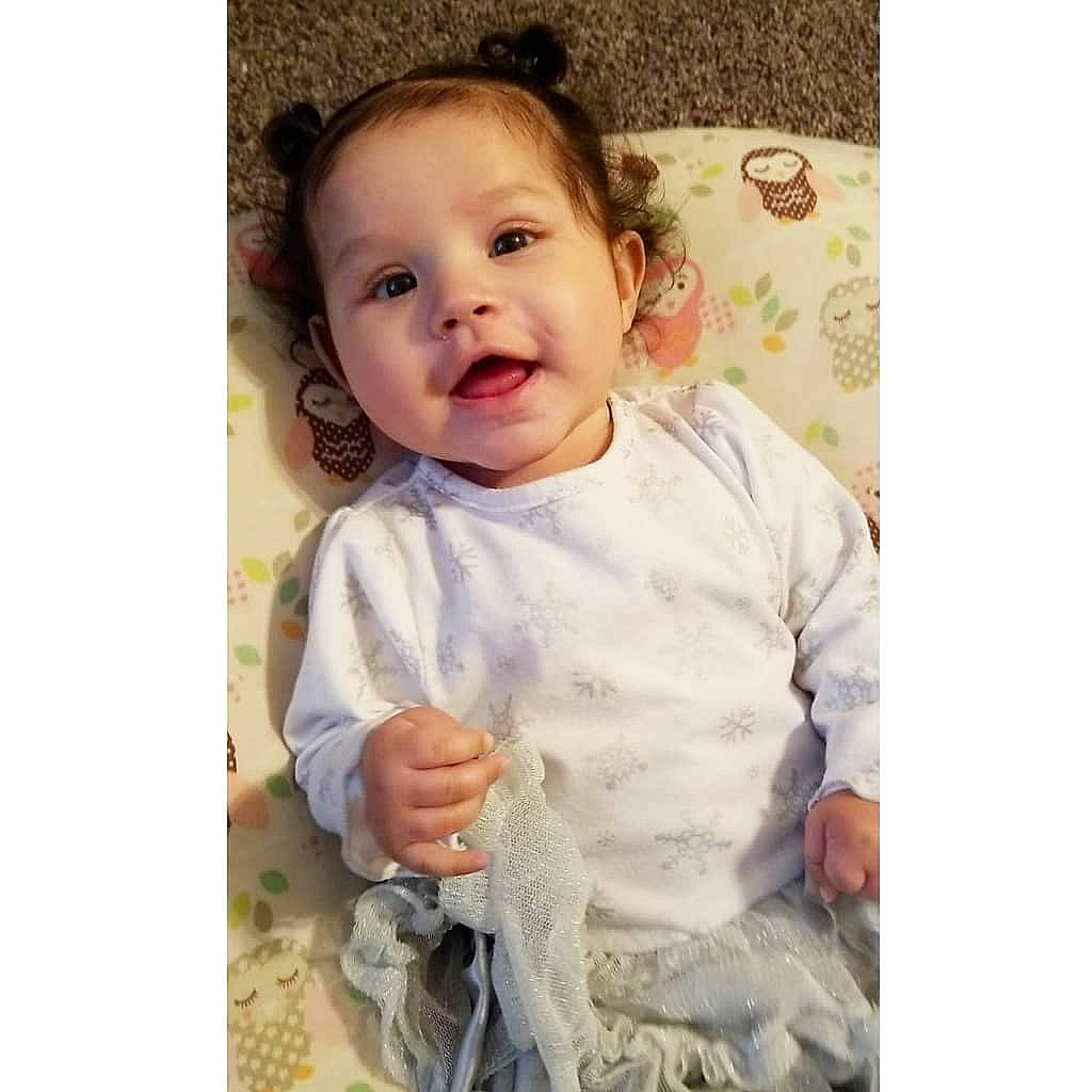 Noelle joined the competition — help win amazing prizes! arm, baby, baby_products, baby_toddler_clothing, cheek, child, face, facial_expression, gesture, hand, happy, head, nose, person, photography, product, sleeve, smile, t_shirt, toddler