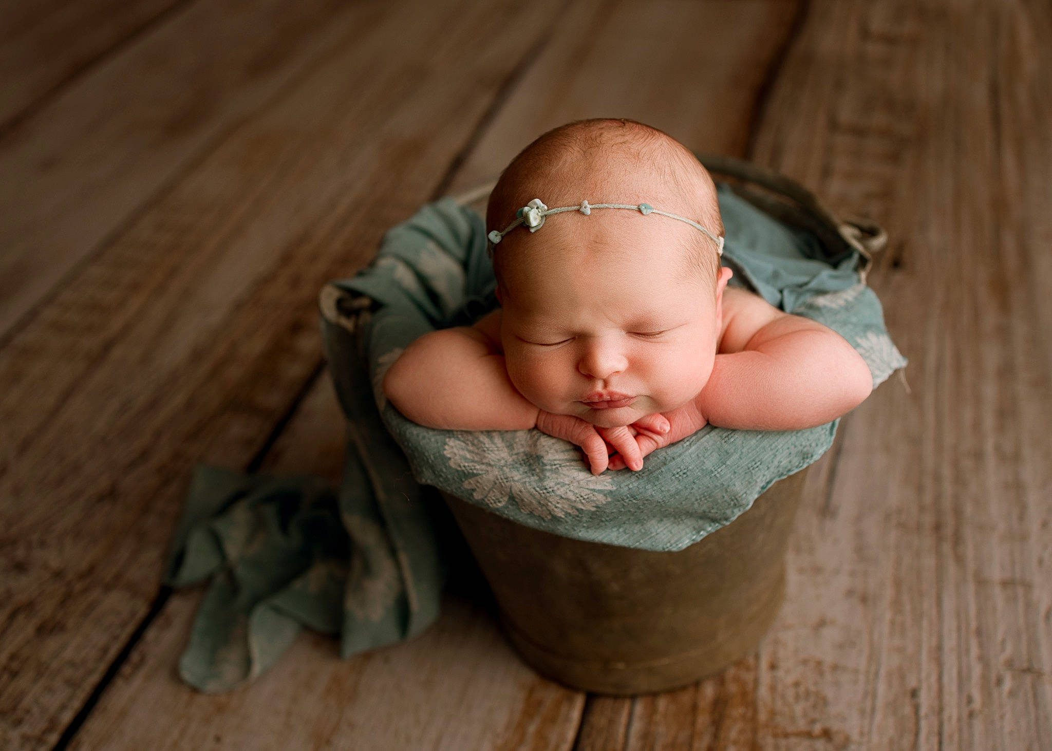 Connie is registered to the contest to win money with this photo: baby, child, person, skin, wood