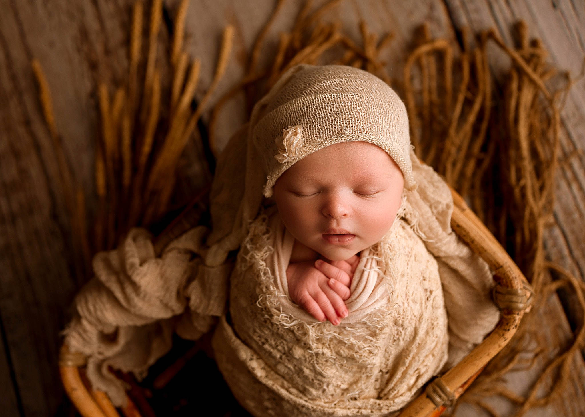 Connie is registered to the contest to win money with this photo: baby, beanie, bonnet, brown, child, eye, face, headgear, person, photograph, photography, portrait, portrait_photography, skin, toddler, tree, wood, wool