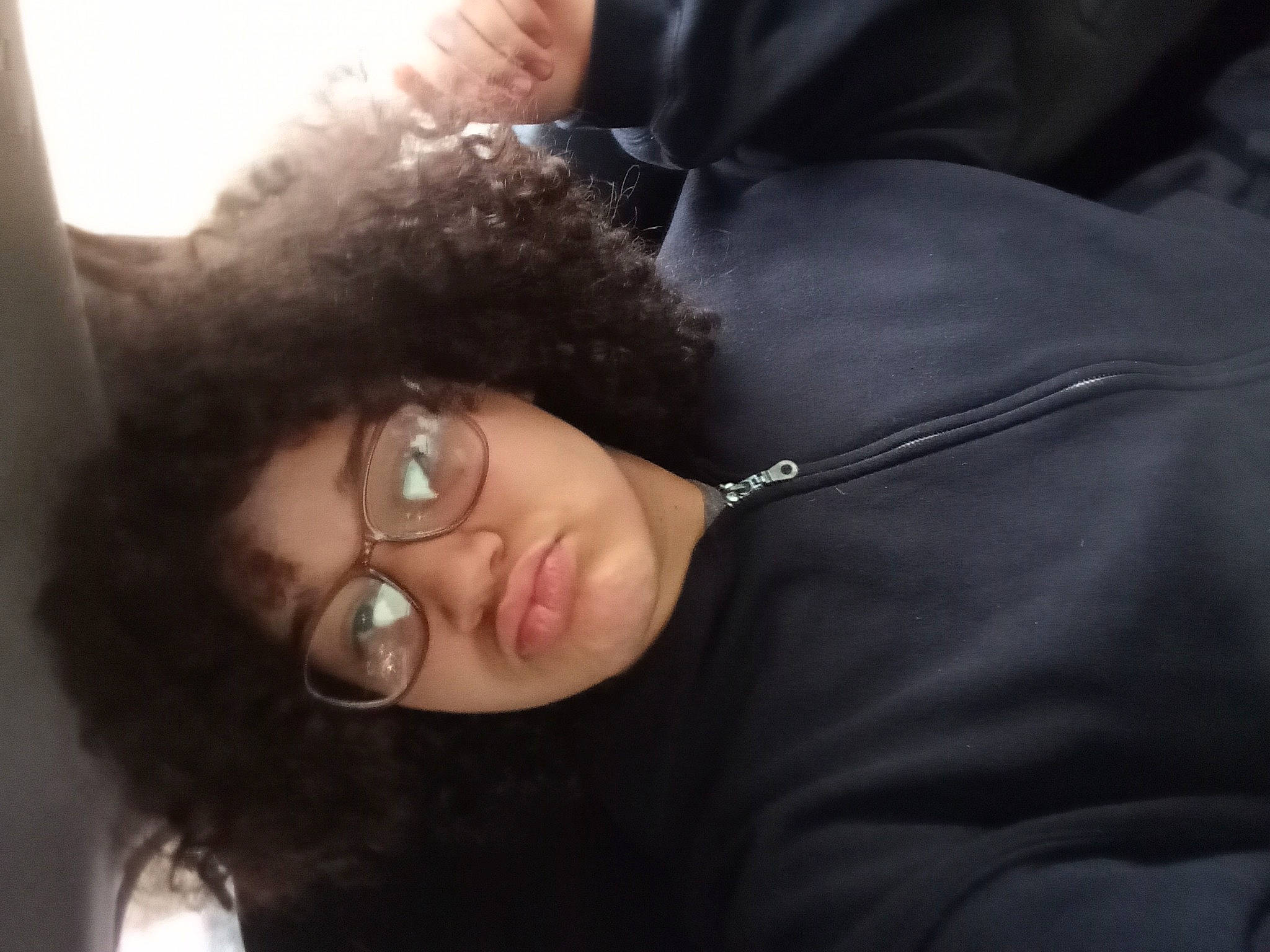 Emonie is registered to the contest to win money with this photo: black_hair, brown_hair, cheek, ear, eyelash, eyewear, flash_photography, fun, fur, gesture, glasses, hair_coloring, happy, jaw, long_hair, nose, person, selfie, smile, tree