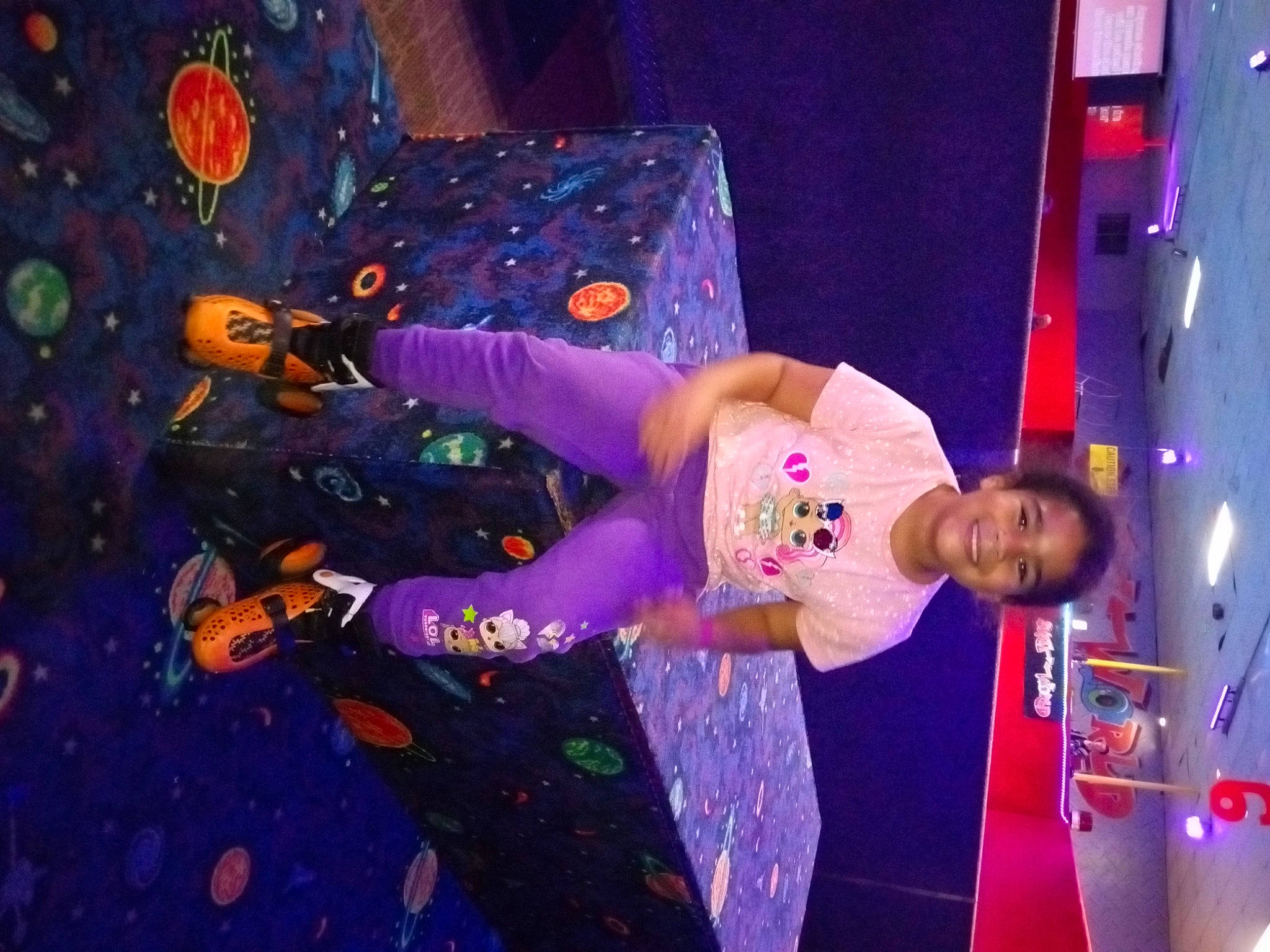 Isabella is registered to the contest to win money with this photo: adventure, artist, climbing, climbing_hold, competition, electric_blue, entertainment, event, fun, joy, leisure, magenta, music, performance, performance_art, performing_arts, person, plant, public_event, purple