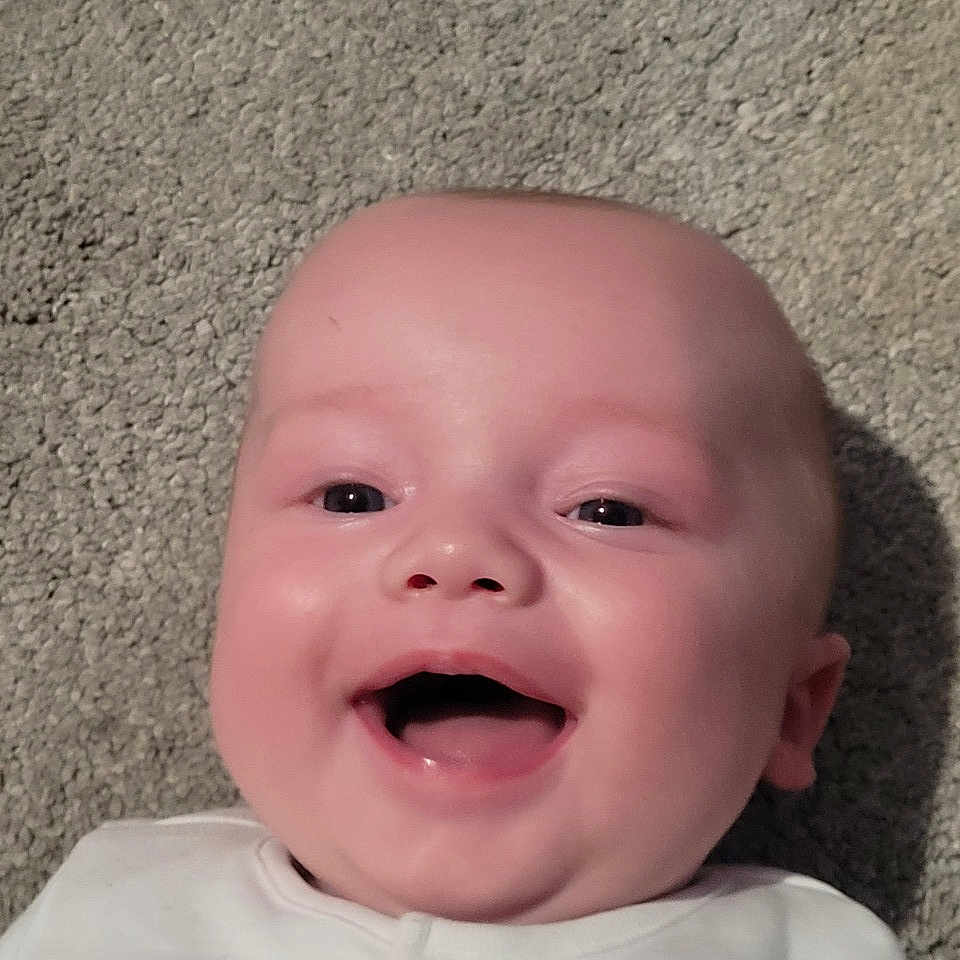 Cillian is registered to the contest to win money with this photo: baby, babylaughing, bodypart, face, happy, head, laughing, mouth, newborn, person, photography, portrait, smile, teeth