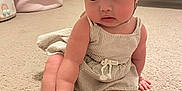 Charleigh is registered to the contest to win money with this photo: baby, bonnet, cap, clothing, crawling, dress, face, hardwood, hat, head, pants, person, photography, portrait, shorts, sitting, sleeve, sunhat, toy, wood