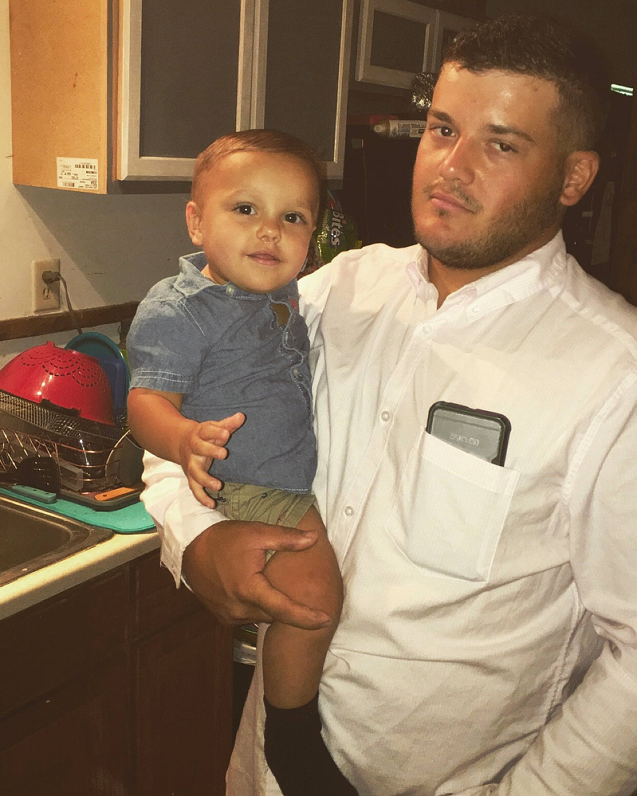 Landry is registered to the contest to win money with this photo: baby, child, daughter, event, family, father, male, person, toddler