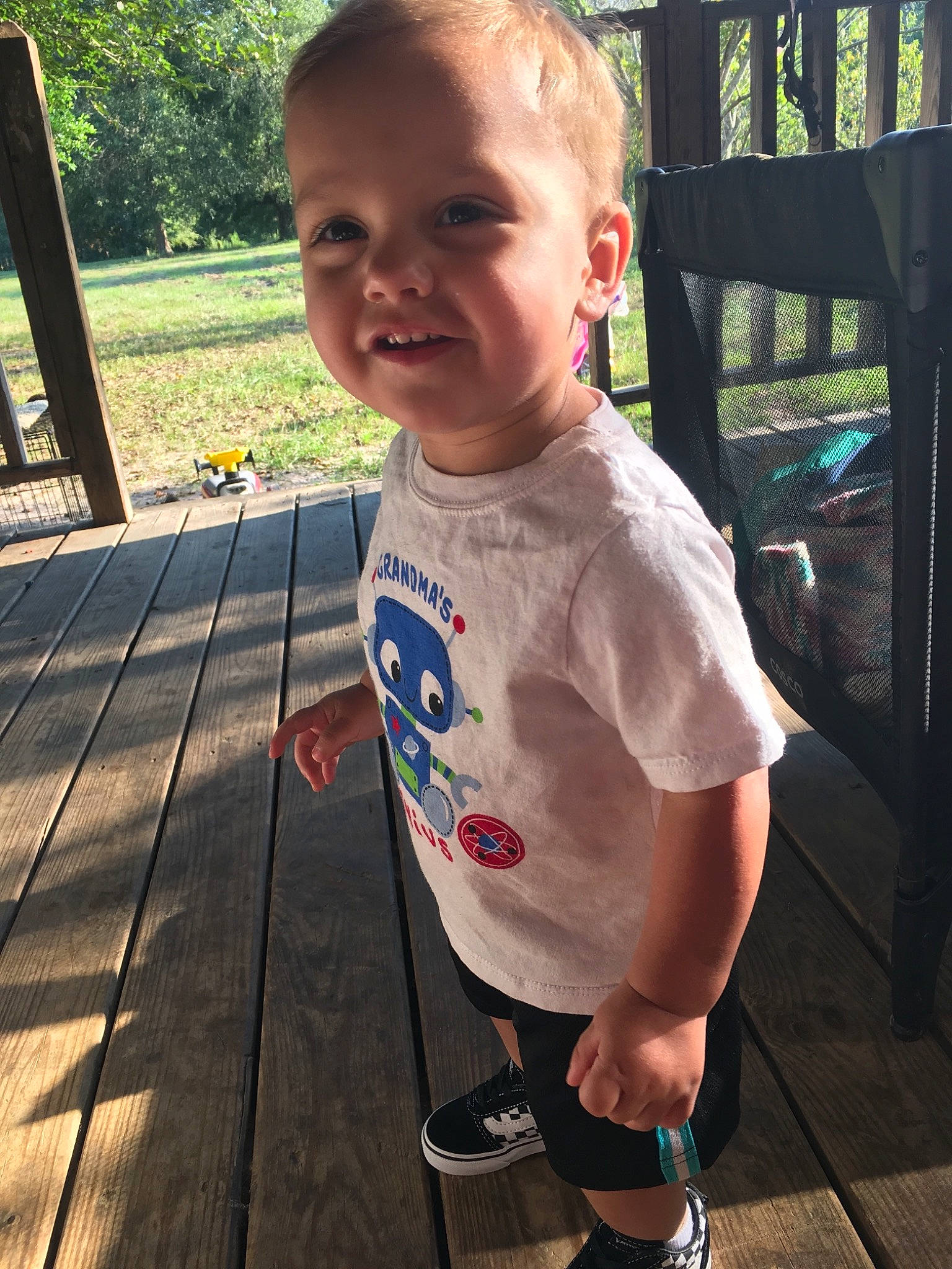 Landry joined the competition — help win amazing prizes! child, cool, ear, facial_expression, happy, head, person, photography, plant, recreation, skin, smile, standing, summer, t_shirt, technology, toddler, tooth, top, tree