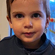 Mathis a rejoint le concours — aidez-le/la à gagner de superbes lots ! child, portrait, face, eyes, hair, jacket, teddy_bear_patch, letter_c, indoor, window, decoration, curious, young, person, clothing, closeup, smile, boy, cute, casual