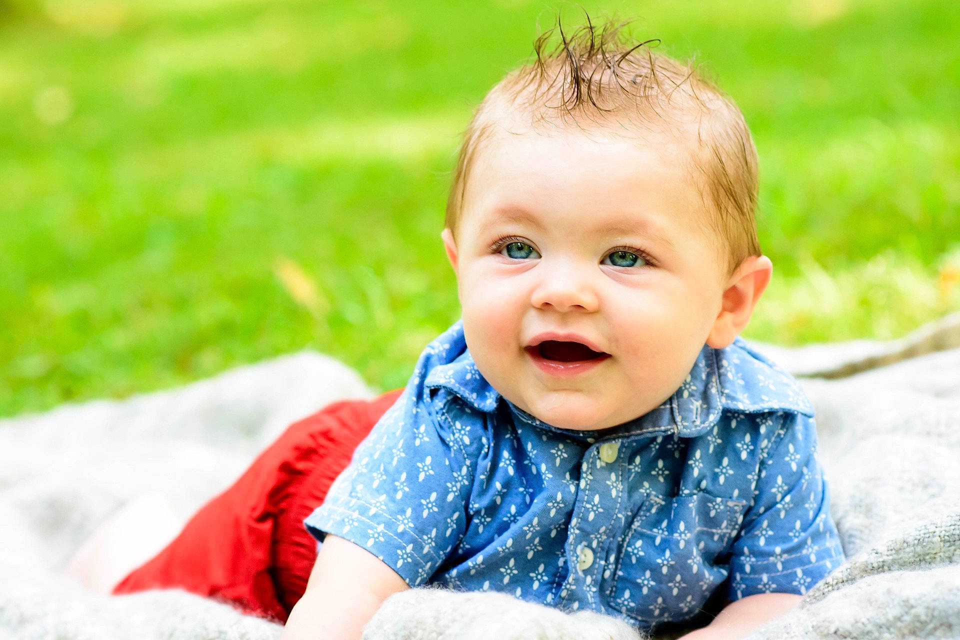 Sean Paxton is registered to the contest to win money with this photo: boy, cheek, child, emotion, eye, facial_expression, fun, girl, grass, happiness, infant, laughter, people, person, photograph, photography, portrait_photography, sitting, skin, smile