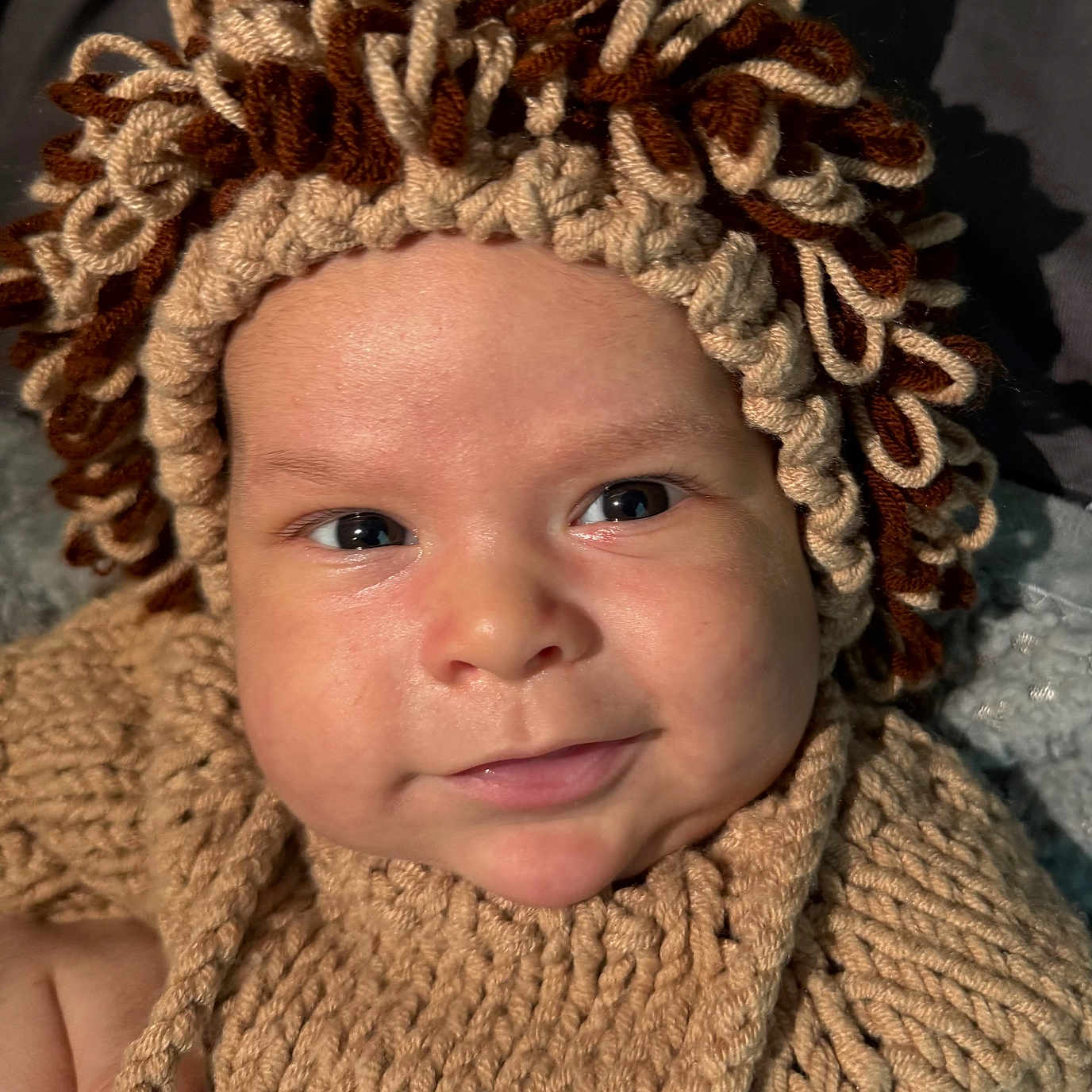 Liam joined the competition — help win amazing prizes! accessories, baby, beanie, bonnet, cap, clothing, face, happy, hat, head, hood, hoodie, knitwear, newborn, person, photography, portrait, smile, sweater, sweatshirt