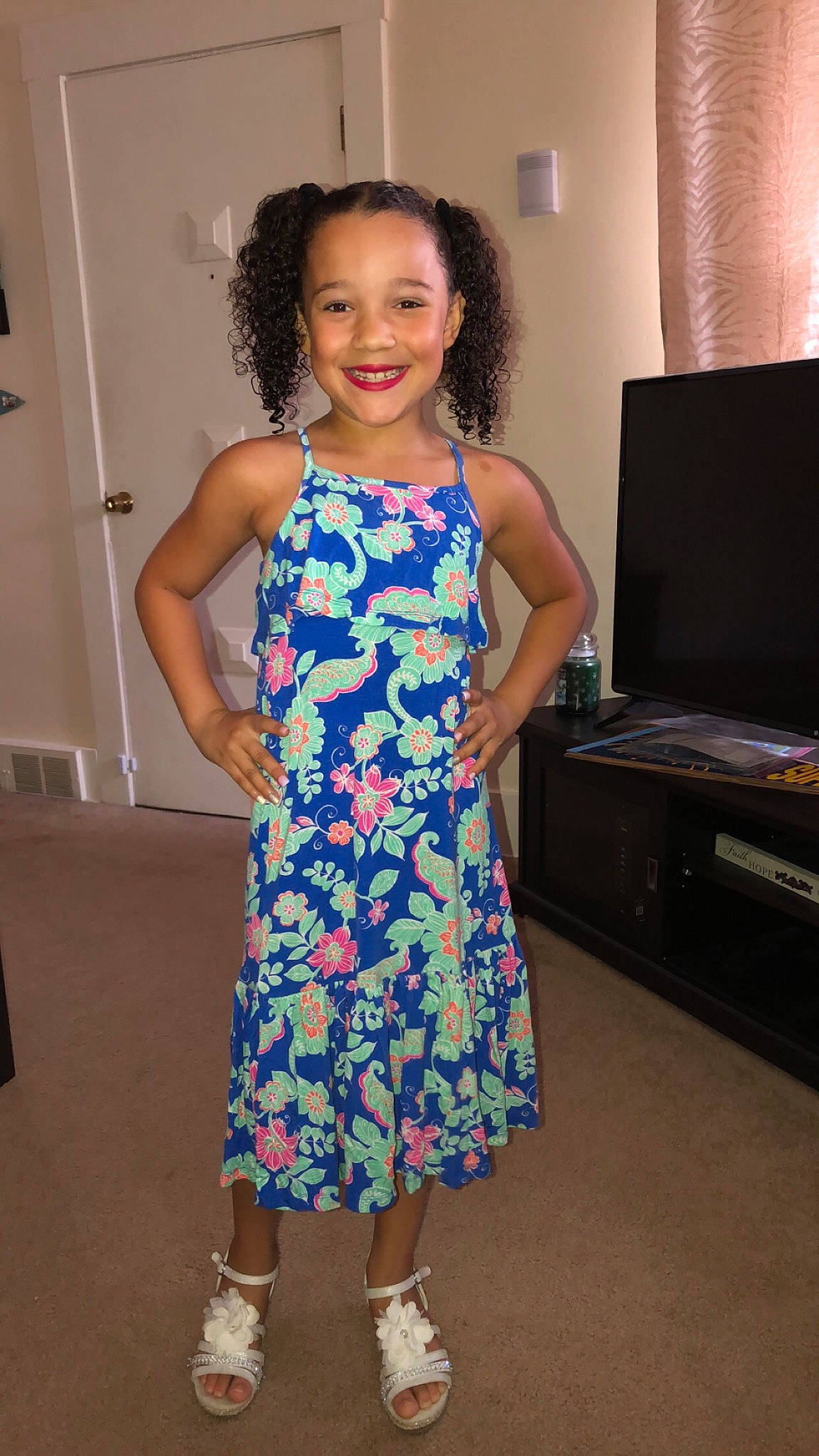 Jordynn joined the competition — help win amazing prizes! blue, child, clothing, day, dress, facial_expression, fashion, flooring, footwear, fun, girl, hair, hairstyle, joy, outerwear, person, product, shoulder, smile, standing