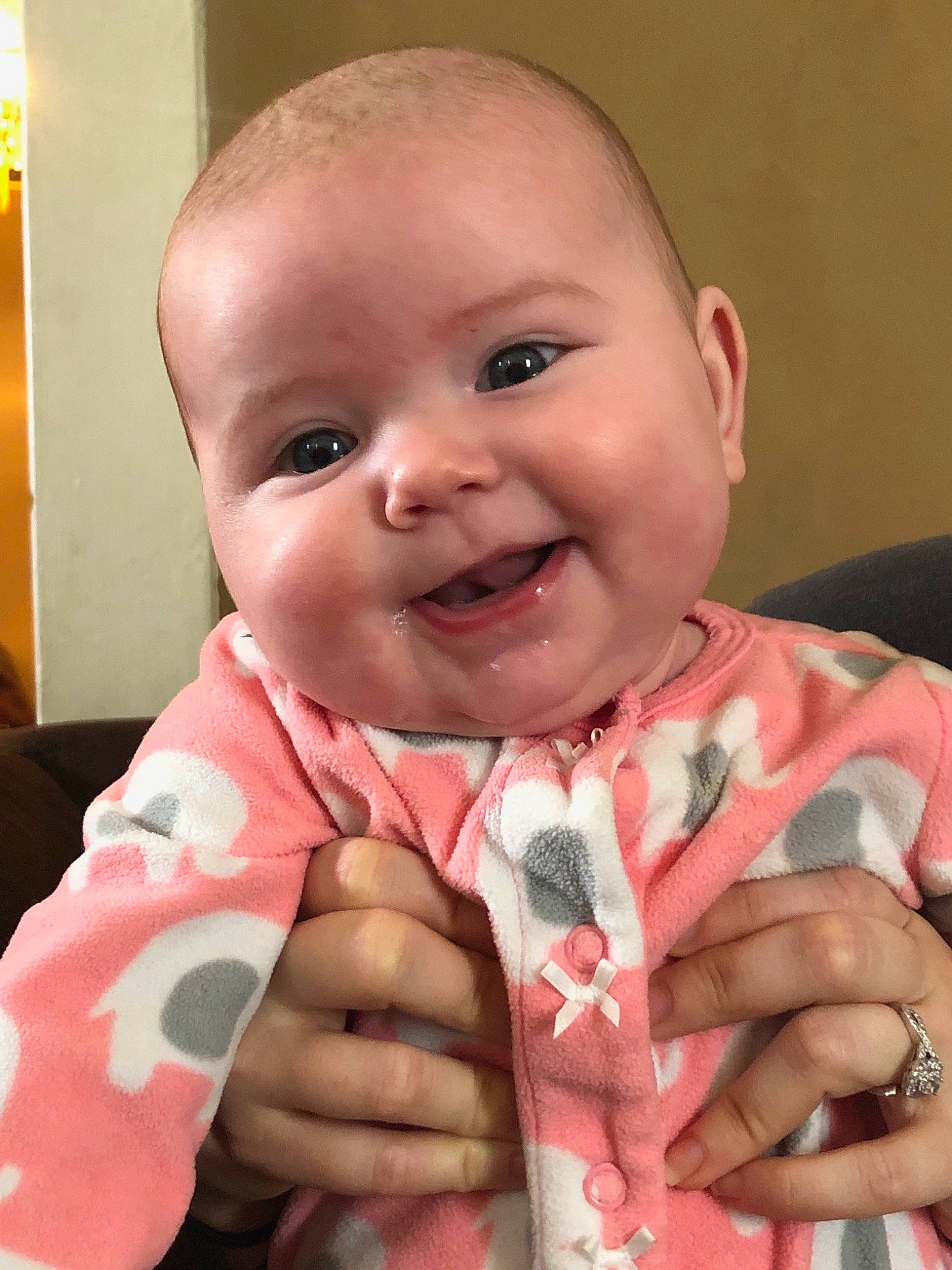 Liliana is registered to the contest to win money with this photo: baby, cheek, child, face, facial_expression, finger, gesture, hand, head, joy, nose, person, pink, skin, smile, thumb, toddler