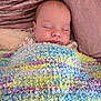 Archie is registered to the contest to win money with this photo: baby, sleeping, blanket, colorful, cozy, cushion, face, infant, indoors, peaceful, plush, portrait, resting, soft, texture, toddler, warm, young_child, comfort, relaxation