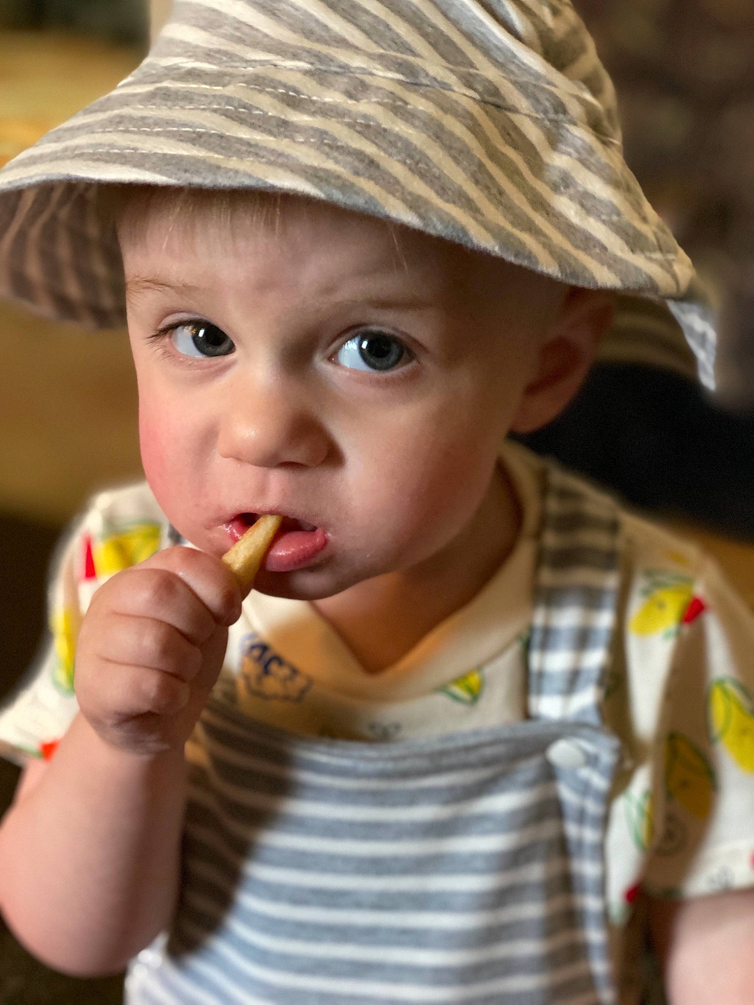 Greyson joined the competition — help win amazing prizes! child, eating, food, hat, headgear, headwear, lip, person, smile, sun_hat, toddler
