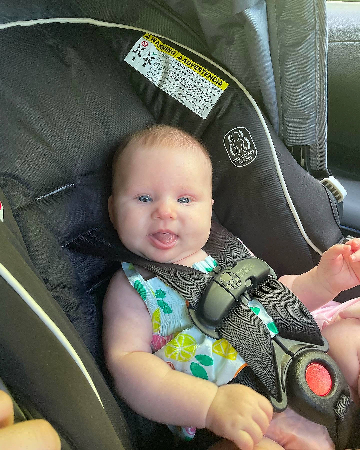 Genevieve is registered to the contest to win money with this photo: auto_part, automotive_design, baby, baby_carriage, baby_in_car_seat, baby_products, baby_toddler_clothing, car_seat, car_seat_cover, chair, child, comfort, eye, finger, green, motor_vehicle, person, product, seat_belt, sitting