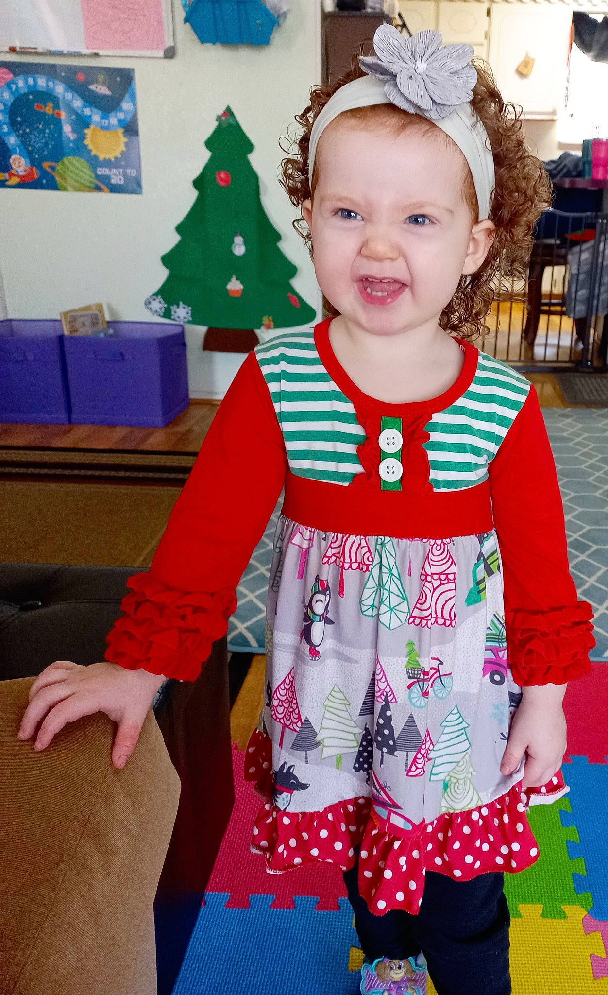 Mandalyn joined the competition — help win amazing prizes! baby_toddler_clothing, child, christmas, christmas_eve, christmas_tree, event, fun, happy, holiday, magenta, pattern, person, pink, red, sleeve, smile, standing, t_shirt, textile, toddler