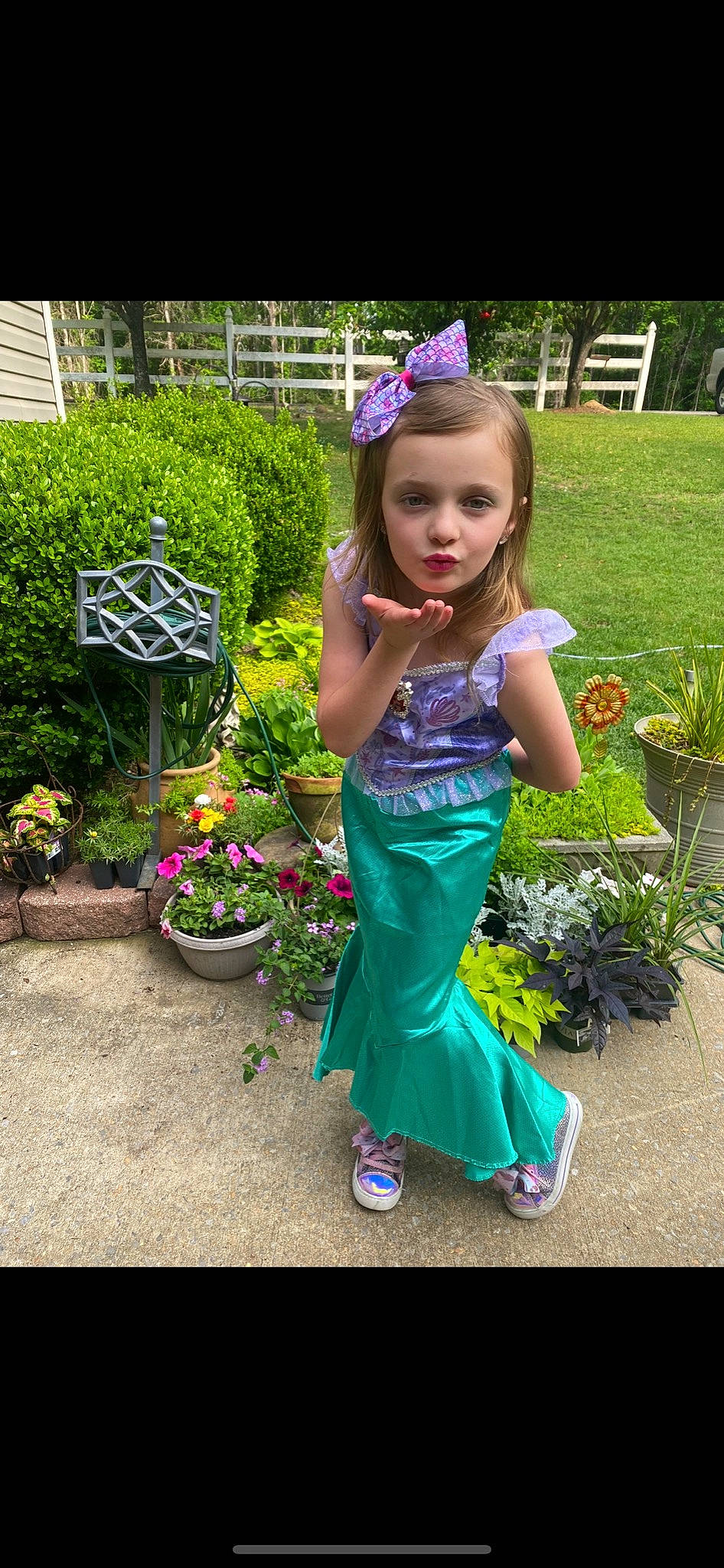 Malaya is registered to the contest to win money with this photo: annual_plant, child, electric_blue, event, flower, flowerpot, fun, garden, grass, hair, happy, houseplant, leisure, magenta, person, pink, plant, shrub, spring, toddler