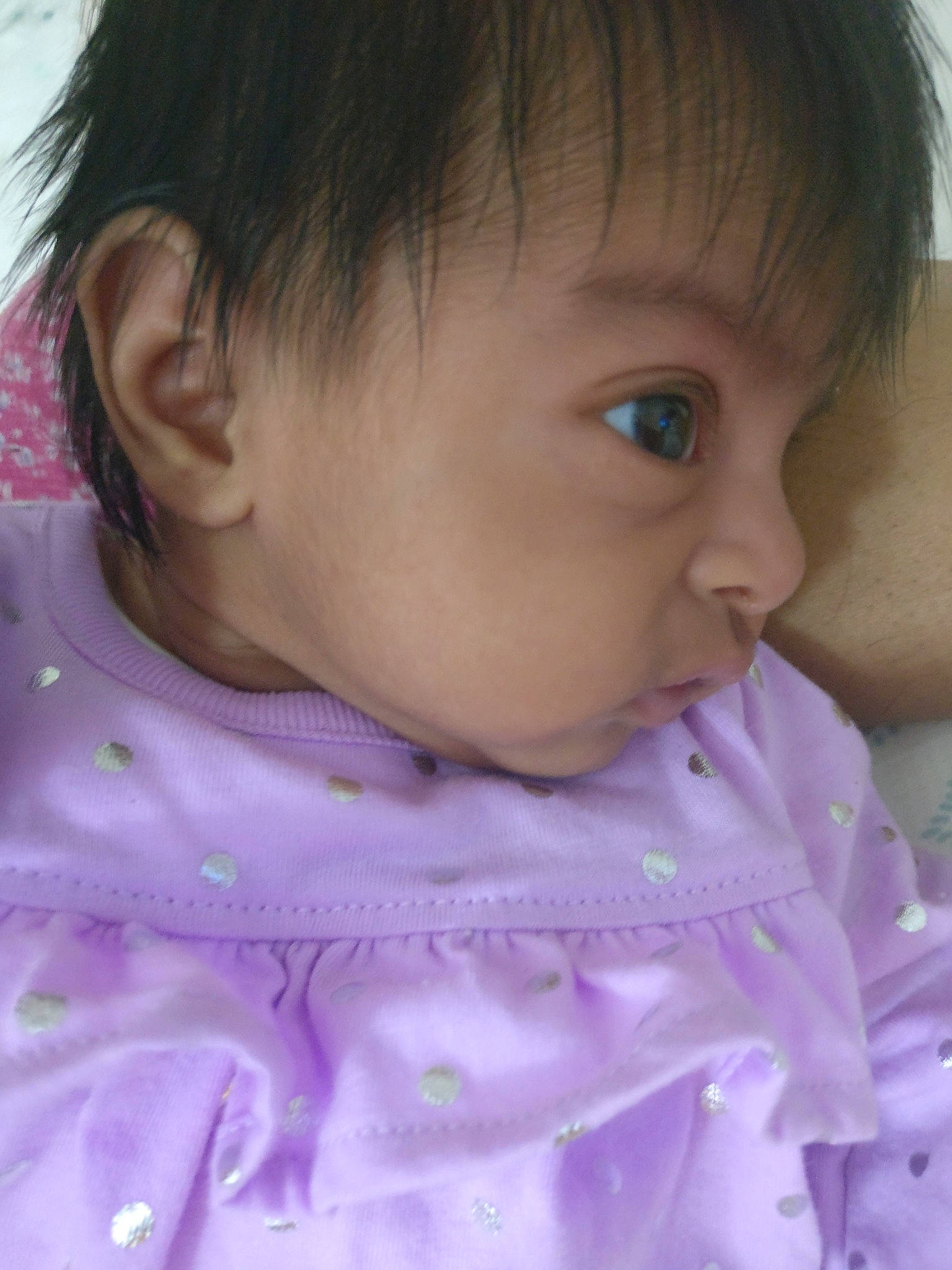 Anika is registered to the contest to win money with this photo: baby, cheek, child, chin, close_up, eye, face, forehead, hair, head, iris, lavender, lilac, lip, neck, nose, person, pink, purple, skin