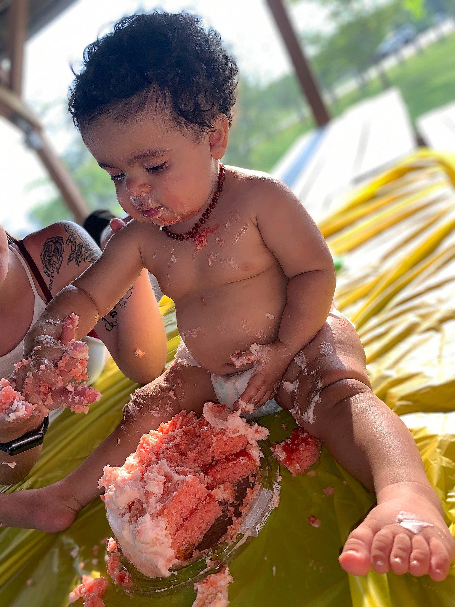 Serenity is registered to the contest to win money with this photo: baby, chest, child, dish, event, face, food, fruit, fun, grass, happy, head, ingredient, leisure, person, plant, recipe, recreation, seafood, smile