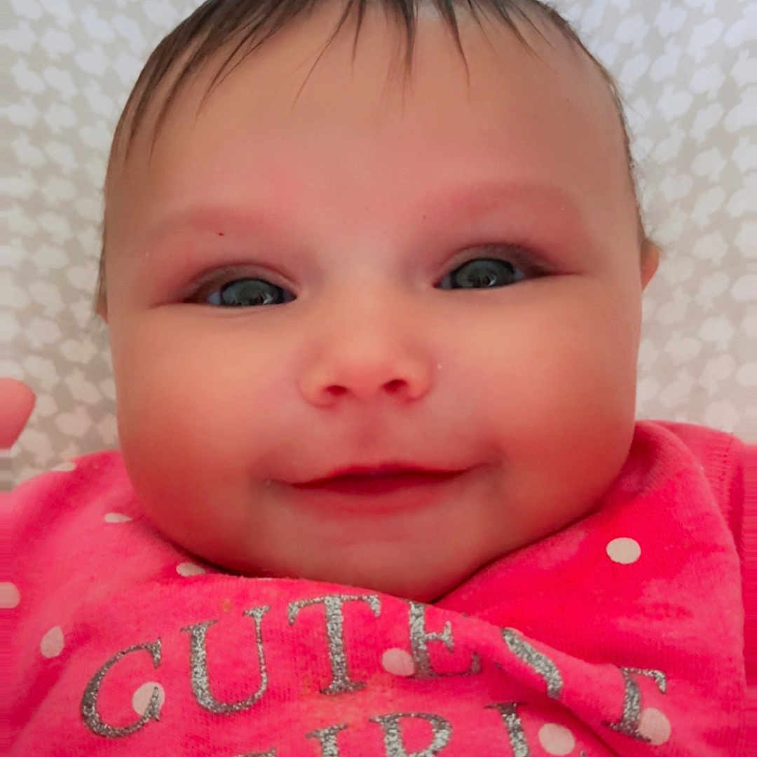 Nalani joined the competition — help win amazing prizes! baby, blanket, bodypart, clothing, face, finger, hand, happy, head, knitwear, mouth, newborn, pants, pattern, person, photography, portrait, quilt, smile, sweater