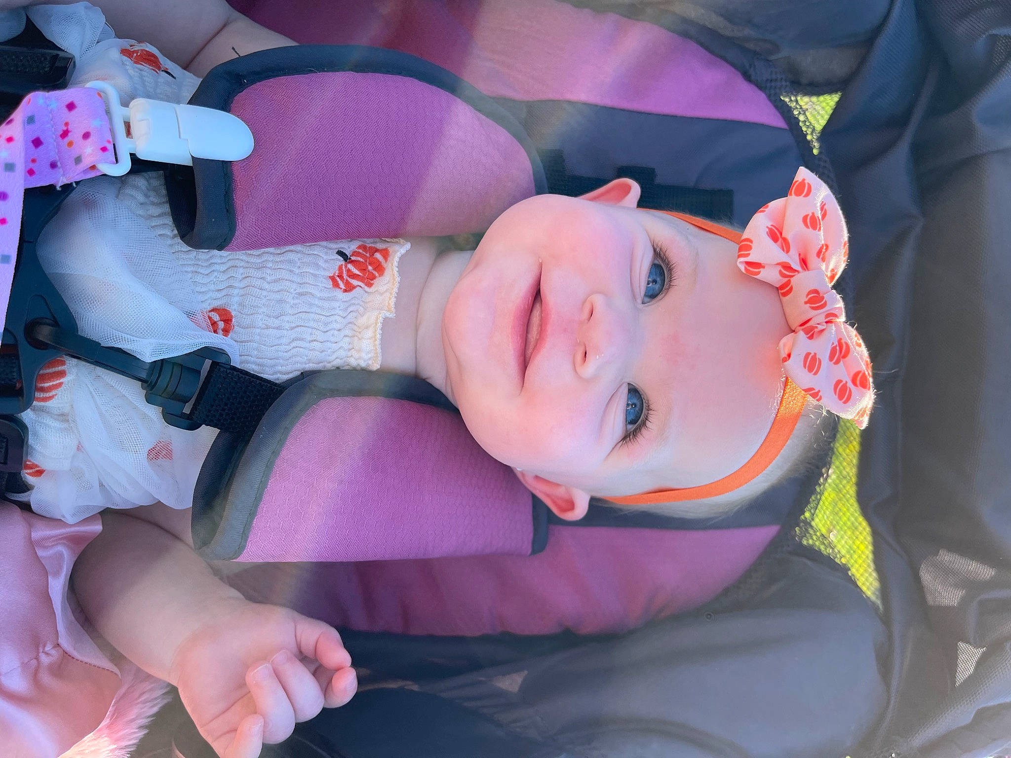 Aspen is registered to the contest to win money with this photo: baby, baby_products, baby_toddler_clothing, child, comfort, eye, facial_expression, finger, happy, hat, headwear, lip, magenta, mouth, person, pink, purple, skin, smile, thigh