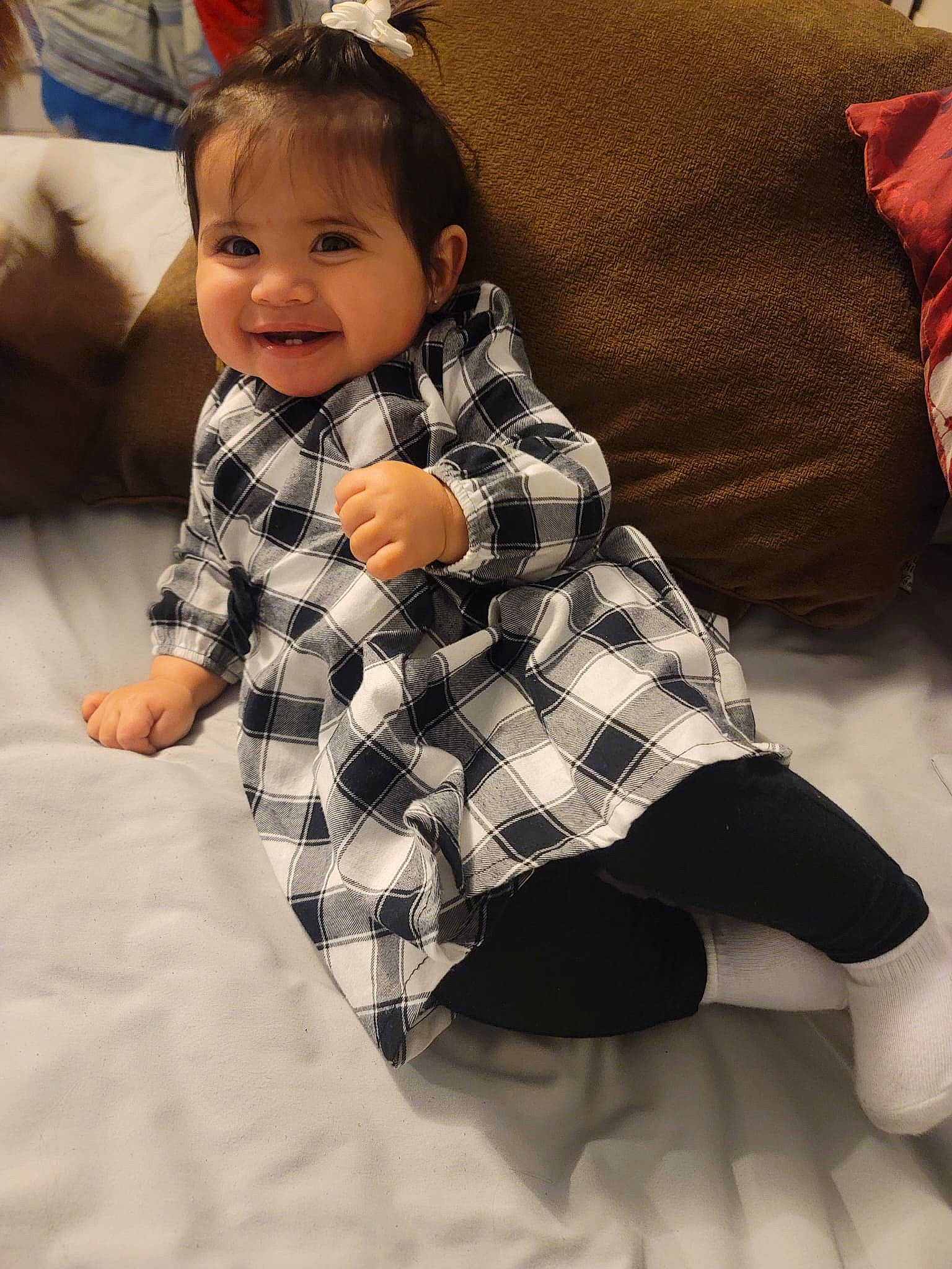 Serena joined the competition — help win amazing prizes! baby, baby_toddler_clothing, child, comfort, design, eye, finger, flooring, hair, happy, head, human_leg, joy, linens, pattern, person, plaid, skin, sleeve, smile
